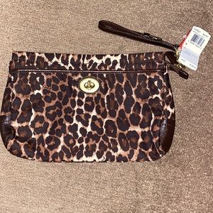 Coach multi colored large clutch, new